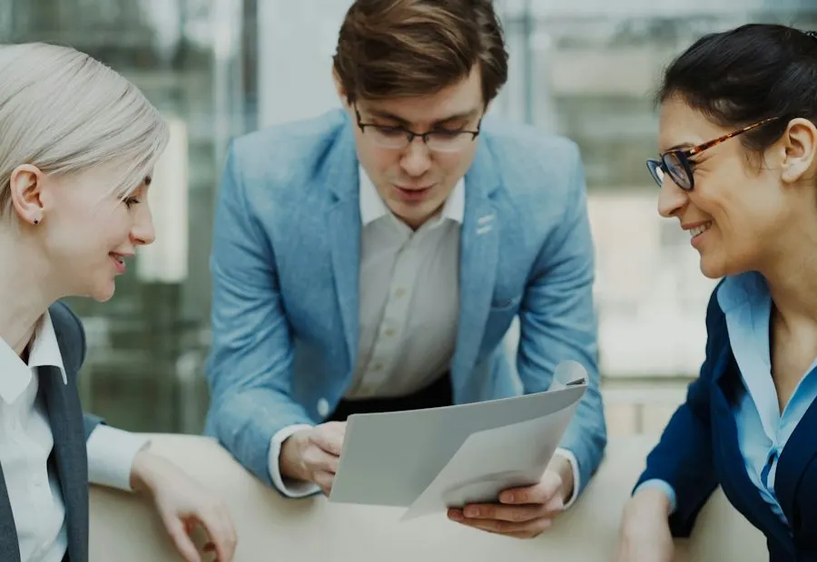 Colleagues reviewing documents together at a table